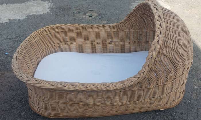 Rocking baby Moses/ wicker bassinet basket with a  fabric skirt.