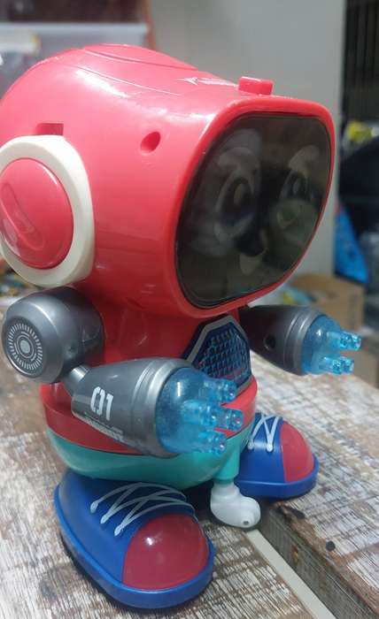 Battery operated dancing music robot