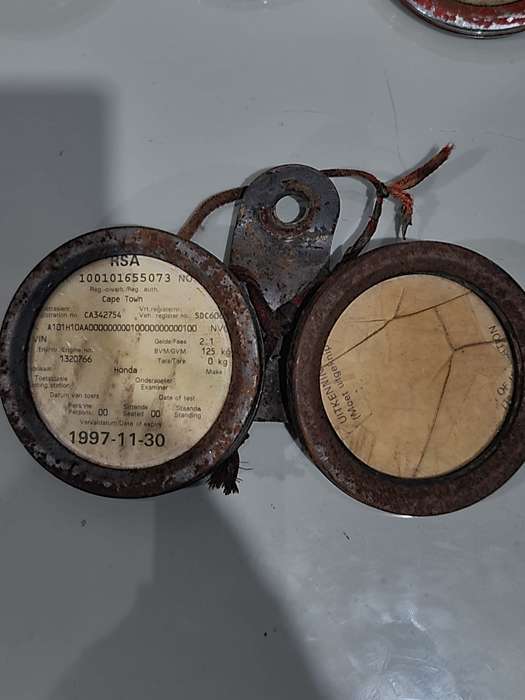 LOT VINTAGE MOTORCYCLE LICENCE DISK HOLDERS