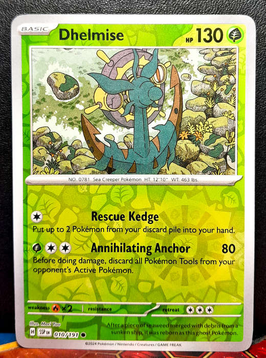 Pokemon Card - Dhelmise 010/064 - Reverse Holofoil - Surging Sparks NM