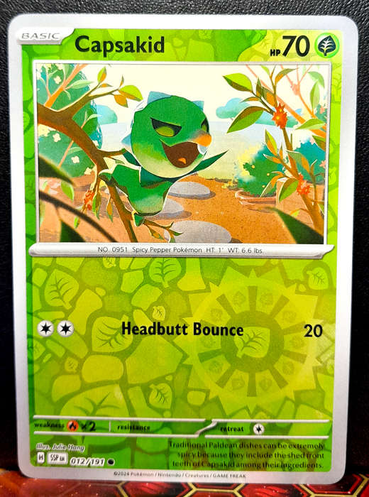 Pokemon Card - Capsakid 012/064 - Reverse Holofoil - Surging Sparks  NM