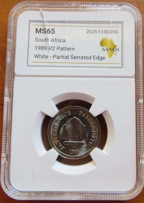 1989 R2 Pattern Coin MS65 SANGS Graded Partial Serrated Edge-Cracked Slab