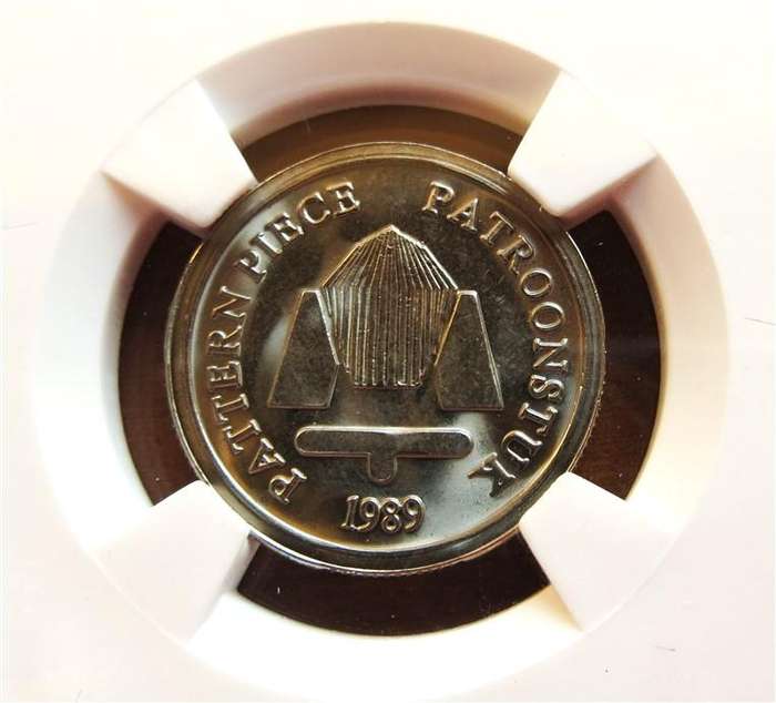 1989 R2 Pattern Coin MS65 SANGS Graded Partial Serrated Edge-Cracked Slab