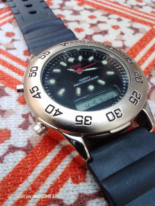 Time quartz with alarm chronograph