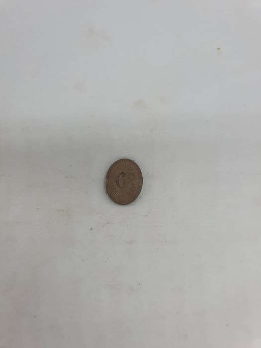 Rare Interment Camp Sixpence Token. Most destroyed.