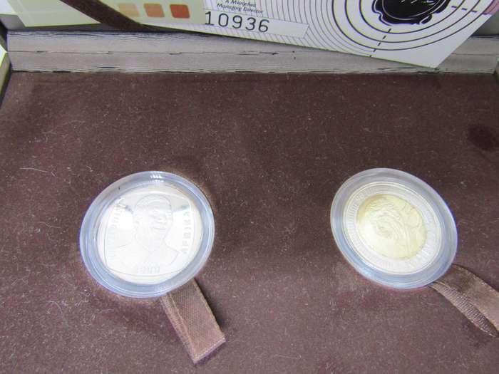 The Nelson Mandela Commemorative R5 coin set. Both Proof