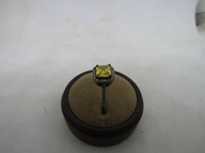 Sterling Silver women's ring with Yellow stone. size 14 box not incl