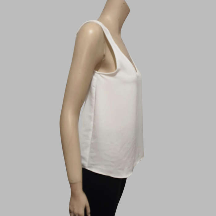 White sleeveless top size 10.
