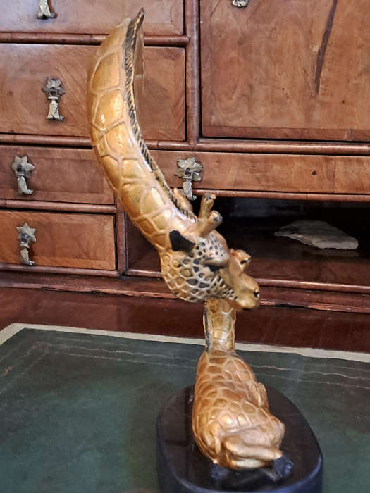Beautiful bronze Giraffe mom and calf