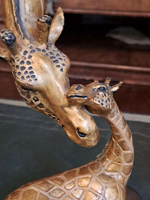 Beautiful bronze Giraffe mom and calf