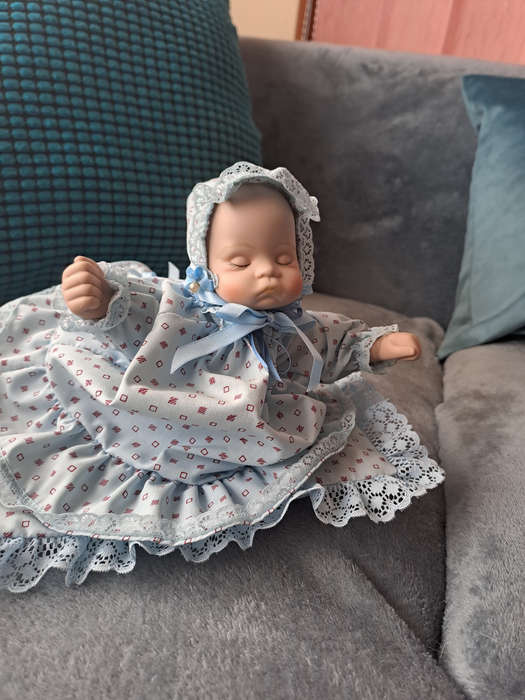 Vintage music and moving porcelain baby doll