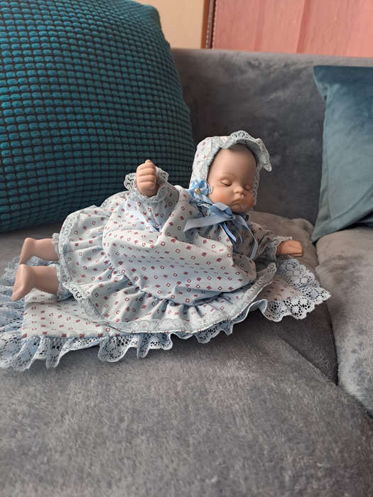 Vintage music and moving porcelain baby doll