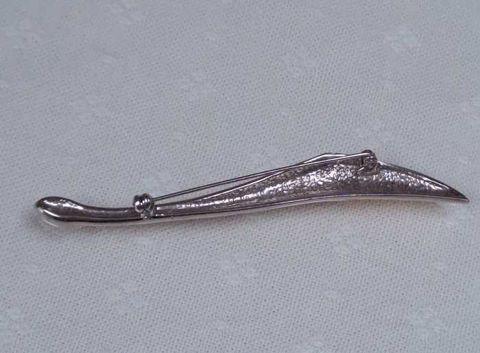 Beautiful vintage swirl bar brooch with gold and silver and stone