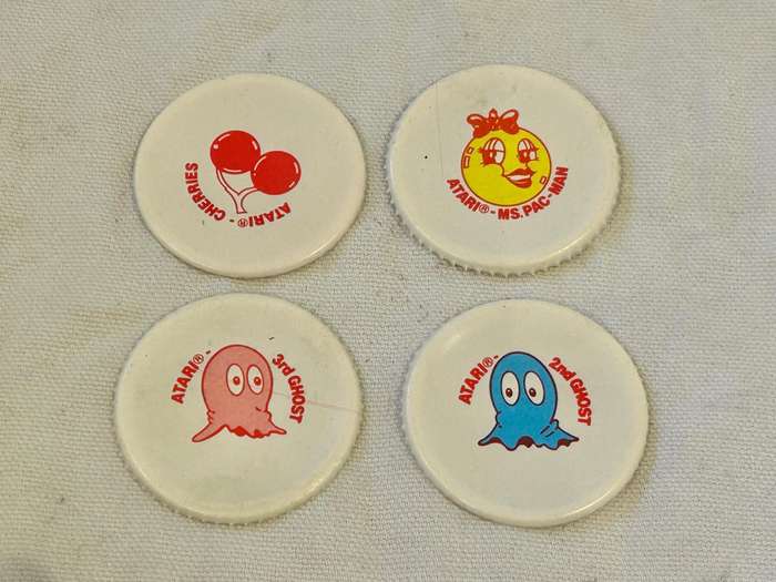 A Genuine South African Coca Cola 1983 MISS PAC-MAN larger 1.5L Bottle Liner competition set of 4