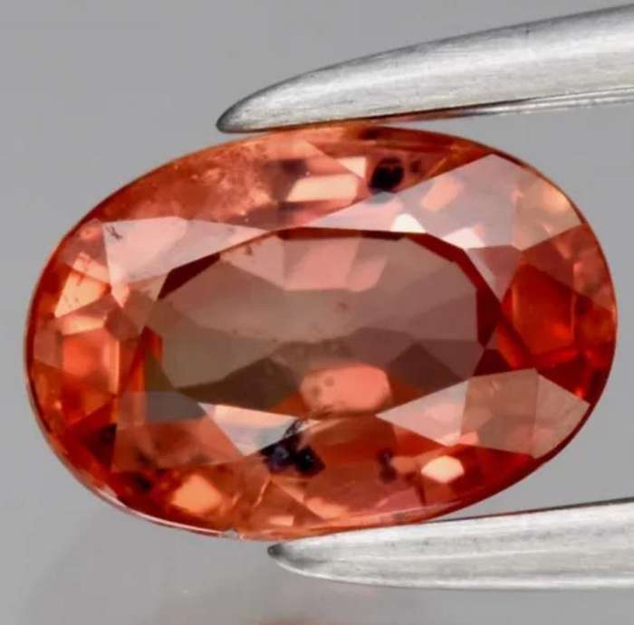 Stunning Oval Cut Natural Pinkish Orange Sapphire