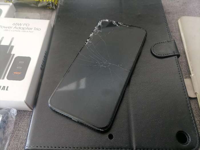 LOT OF APPLE PHONE, TABLET,NEW PHONE COVERS , ETC, ONE BID FOR THE LOT*