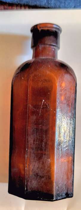Vintage Small Octagonal Brown Glass Milton Bottle