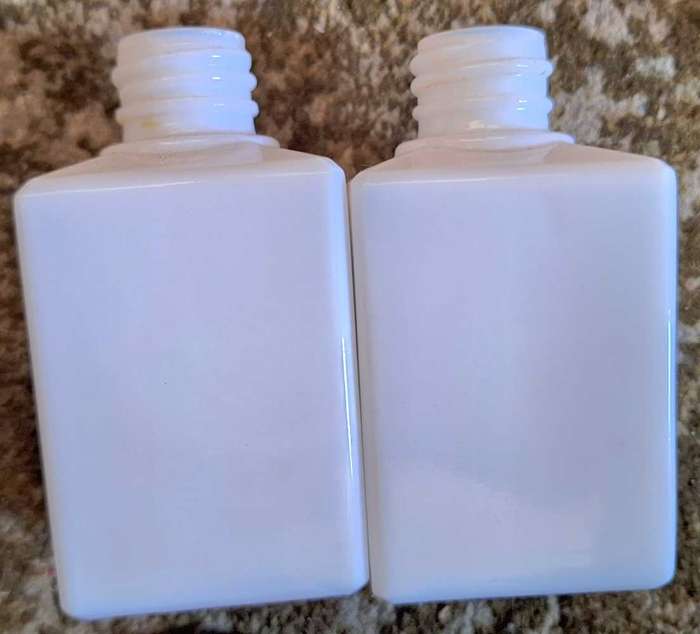2 Vintage Milk Glass Possibly Perfume bottles