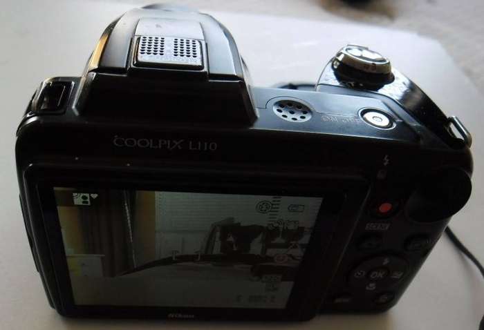NIKON COOLPLX L110 CAMERA WITH BAG CABLE ETC. REQUIRES 4 AA BATTRIES NOT SUPPLIED(MAKE OFFER)