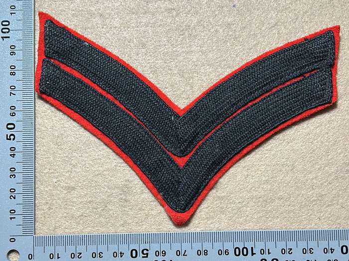 RHODESIA REGIMENT - CORPORAL SLEEVE RANK ON RED