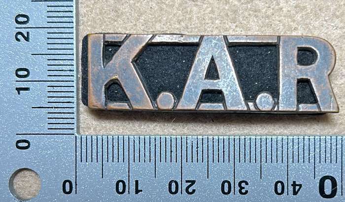 RHODESIA KINGS AFRICAN RIFLES - KAR SHOULDER TITLE WITH BACKING FELT