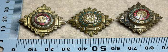 RHODESIA CROWNS AND PIPS - 3 BRASS PIPS WITH RED ENAMEL