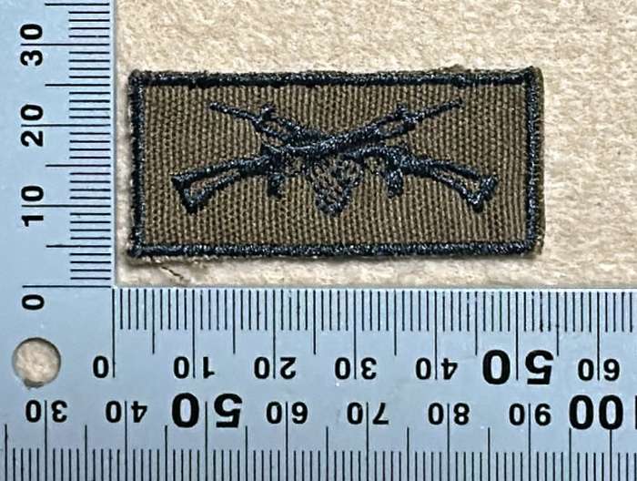 SWA Marksman Qualification Badge embroidered on Nutria