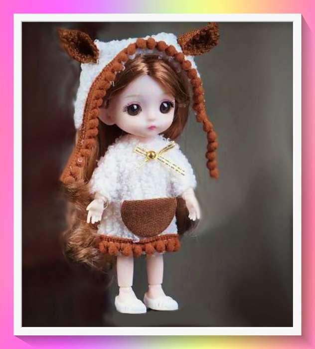 Adorable doll with full knitted outfit and surprise gift