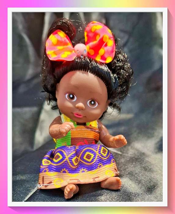 Adorable little pocket size curly hair doll