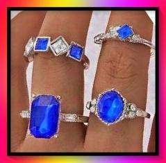 Interesting 4 piece ring set with blue simulated gemstones