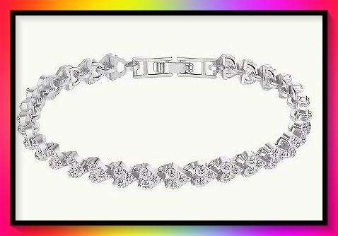 Awesome Heart design silver colour simulated topaz tennis bracelet