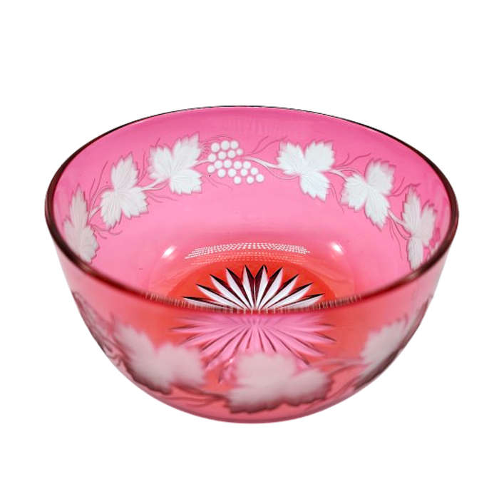 Beautiful engraved cranberry glass bowl decorated with fruiting vine