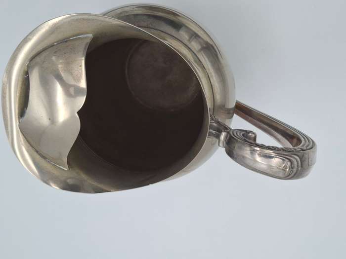 Vintage Silver Plated Pitcher with Embossed Ornate Design on the Handle and Base