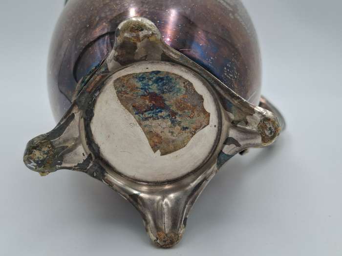 Vintage Silver Plated Pitcher with Embossed Ornate Design on the Handle and Base