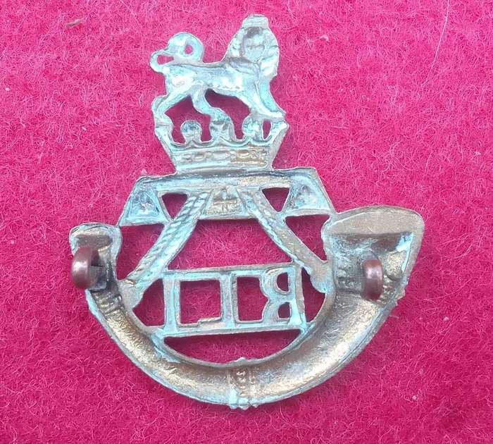 RAND LIGHT INFANTRY CAP BADGE - WORN 1913-1950