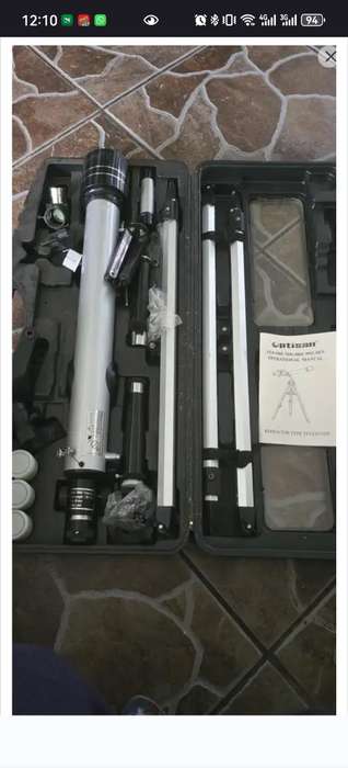 REFRACTOR TYPE TELESCOPE (COMPLETE SET WITH TRIPOD)IN CASE-MINT CONDITION