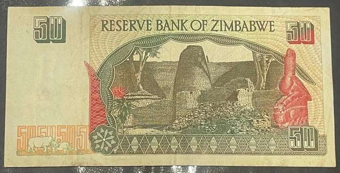 1994 ZIMBABWE 50 DOLLARS NOTE - LEONARD TSUMBA GOVERNOR + RHINO LOGO