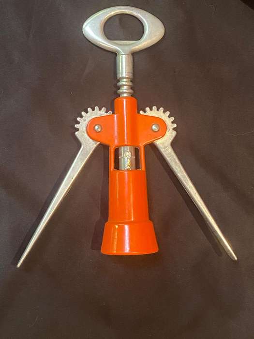 VINTAGE ORANGE TAVERNELLO HEAVY BOTTLE OPENER