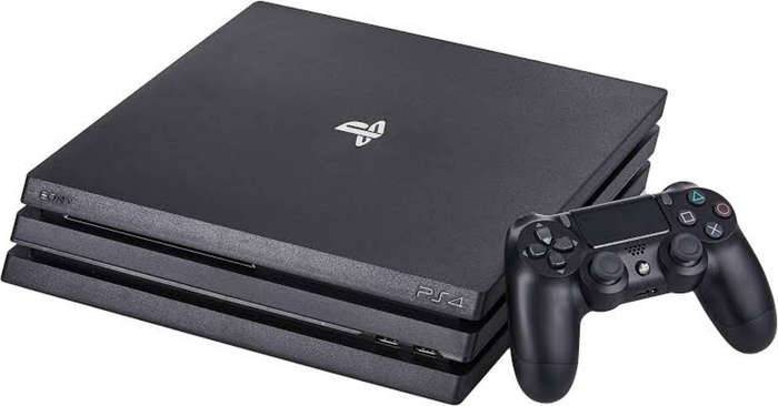 Ps4 Pro console with 2x games and 1x controller