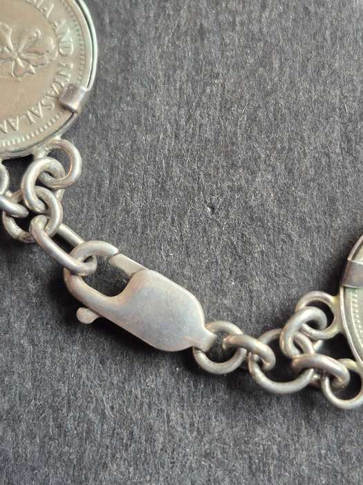 Rhodesia 2 1/2 Cents (Tickey) and Rhodesia and Nyasland Threepence Bracelet 9.25 Silver mount/catch