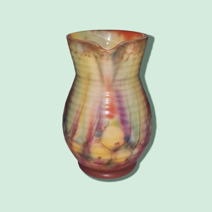 Tunis pottery Harlequin pitcher jug