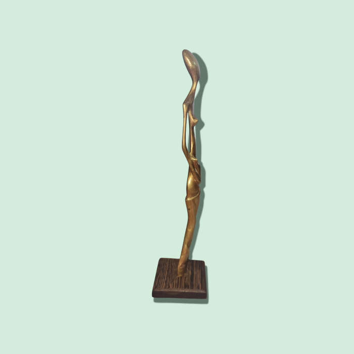 WOMAN BRASS FIGURINE