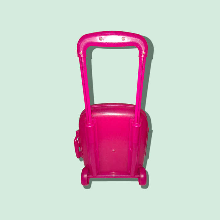 Child's Wheeled Suitcase Extending Handle with two Barbie dolls and accessories