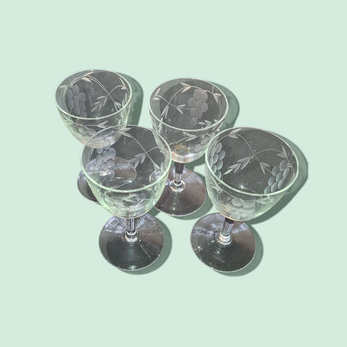 Sherry glasses with etched grapes motif