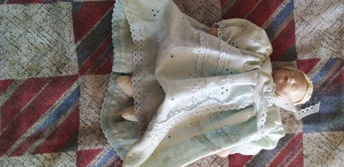 SMALL BABY PORCELAIN DOLL,