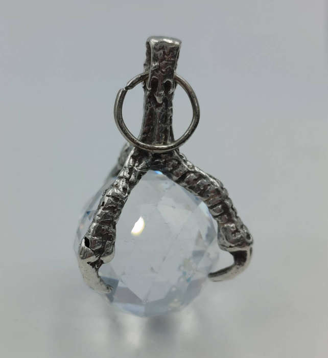 Silver claw pendant