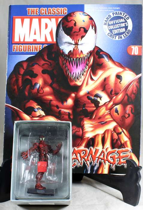 Marvel comics - lead, hand painted figurine with book - Carnage #70