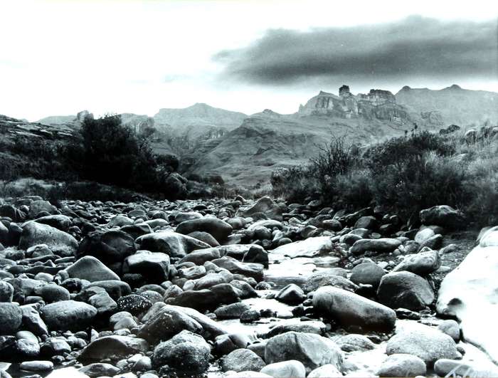 James Cousin - Artistic photo of bedrock in the river