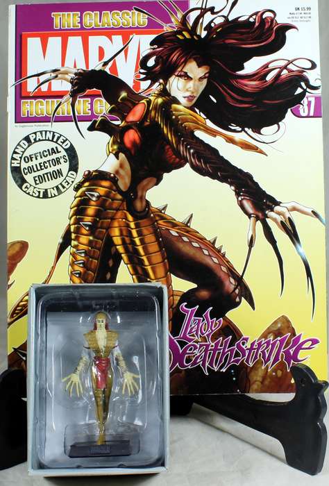 Marvel comics - lead, hand painted figurine with book - Lady Deathstrike #87