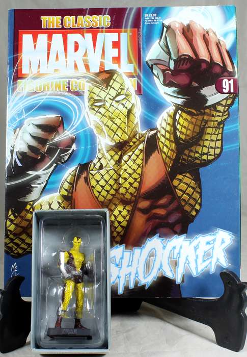 Marvel comics - lead, hand painted figurine with book - Shocker #91